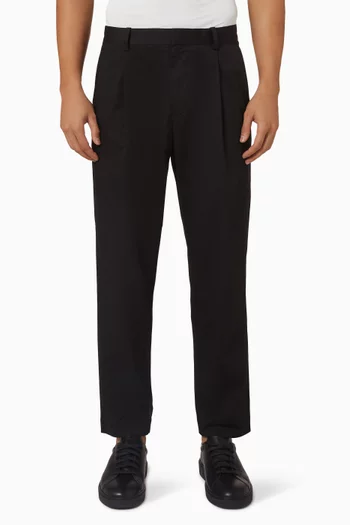 Relaxed-fit Pleated Cotton Tapered Trousers