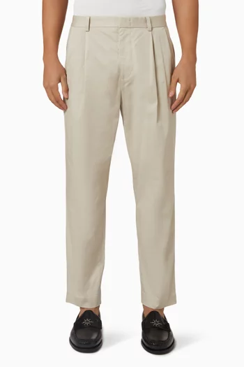 Relaxed-fit Pleated Cotton Tapered Trousers