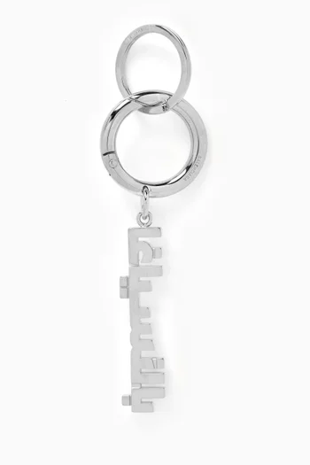 سلسلة مفاتيح بشعار بالنسياغا باللغة العربية نحاس