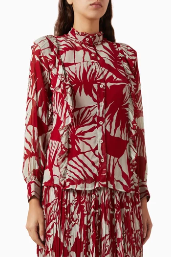 بلوزة بكشكش ونقشة زهور