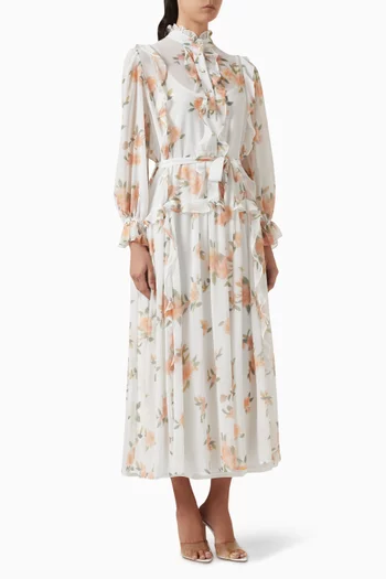 فستان متوسط الطول بنقشة زهور وكشكش