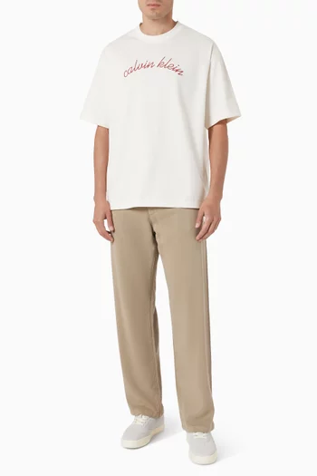 تي شيرت مطرز بشعار الماركة بغرزة السلسلة قطن