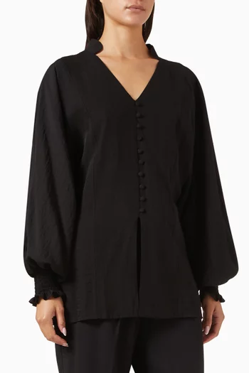 بلوزة بأكمام منفوخة