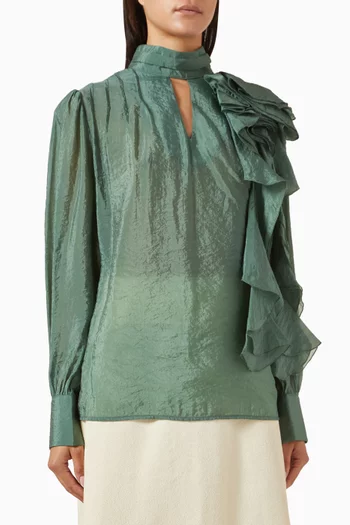 بلوزة بحواف كشكش