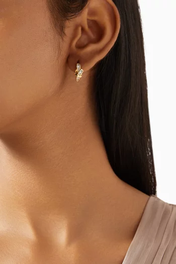 Love Knot Baguette Huggie Earrings in Gold-plated Brass