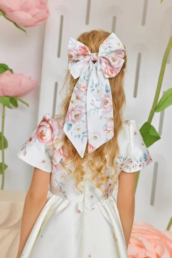 عقدة شعر بنقشة زهور قطن