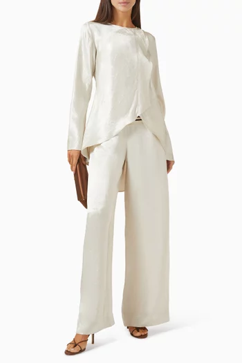 Naia Asymmetric Top