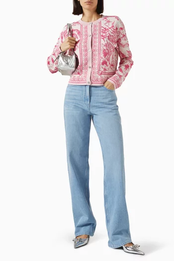 بنطال جينز بخصر مرتفع وحلي معدنية بشعار رأس ميدوسا دينم