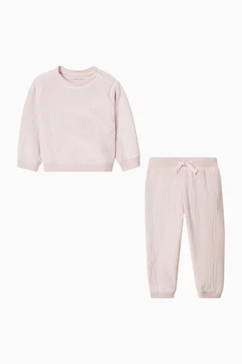 تي شيرت بفتحة رقبة مستديرة وشعار الماركة قطن