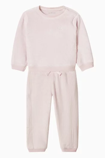 تي شيرت بفتحة رقبة مستديرة وشعار الماركة قطن