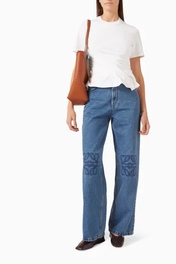 بنطال جينز فضفاض بشعار الماركة دينم