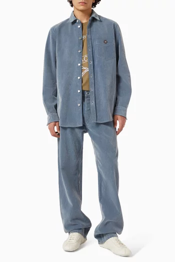 قميص بشعار الماركة دينم