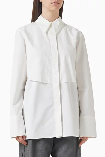 قميص بطبقة وأزرار