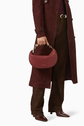 حقيبة بتصميم هلال بيد علوية جلد عجل 