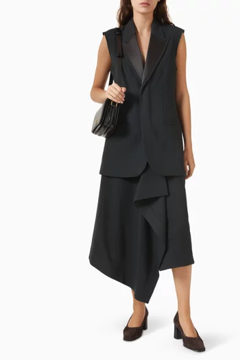 تنورة متوسطة الطول بتصميم ملفوف صوف