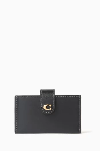 حافظة بطاقات متعددة الاستخدامات بشعار الماركة جلد