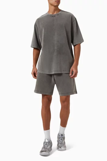 تي شيرت بأكمام قصيرة ولون باهت قطن