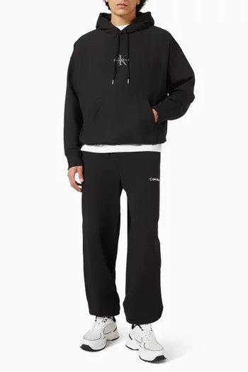 كنزة بغطاء رأس بشعار الماركة قماش تيري