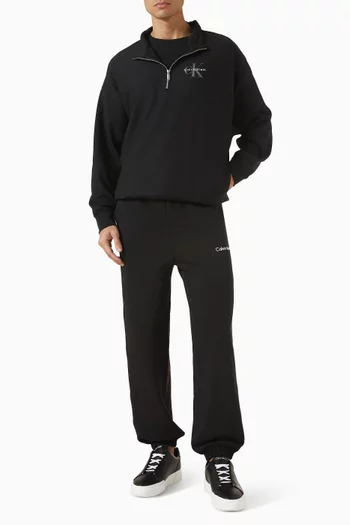 سويت شيرت بشعار الماركة وسحّاب قصير وقصة فضفاضة قماش تيري فاخر