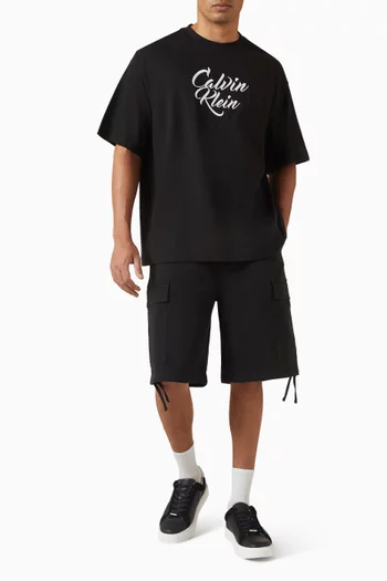 تي شيرت بطبعة شعار الماركة بخط اليد قطن جيرسيه