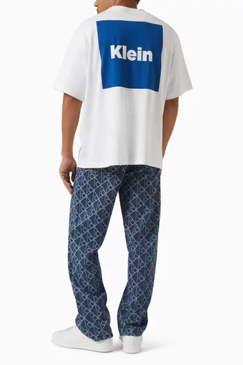 تي شيرت فضفاض بطبعة مربعة وشعار الماركة قطن