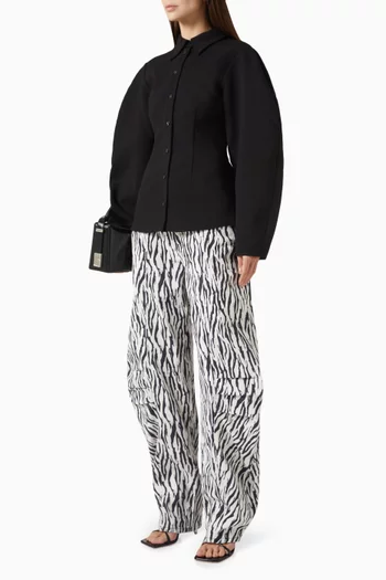 قميص بقصة تضيق باتجاه الأسفل قماش بدل