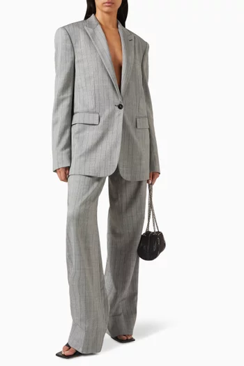 بنطال بقصة ساق واسعة ونقشة مخططة صوف