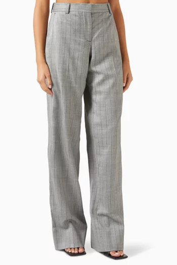 بنطال بقصة ساق واسعة ونقشة مخططة صوف