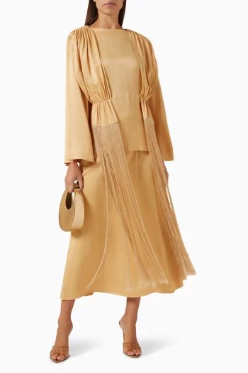 بلوزة بشرّابات وطيّات