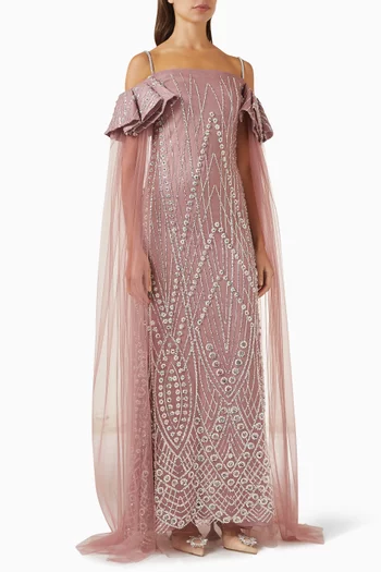 فستان سهرة بأكتاف مكشوفة وتطريزات تول