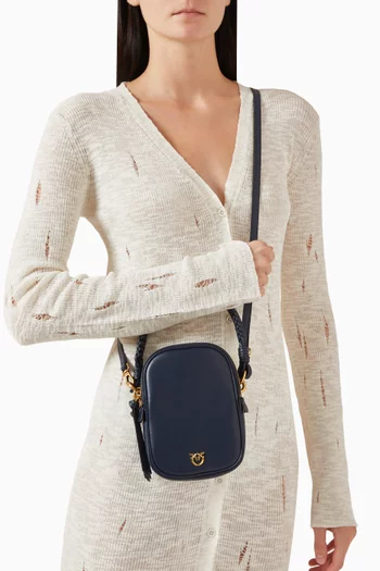 حافظة صغيرة بيد علوية جلد