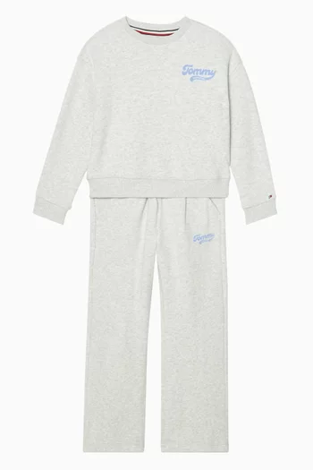 سويت شيرت بقصة فضفاضة وشعار الماركة بتصميم جامعي وبارز الملمس