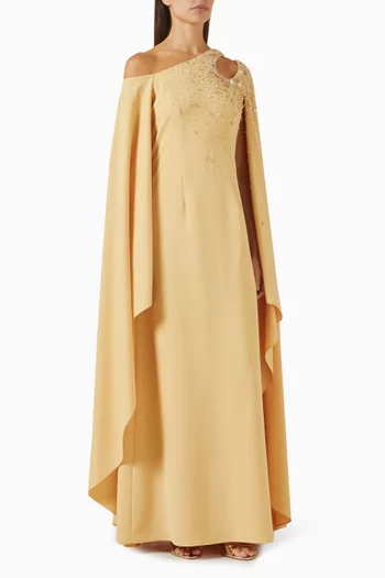 فستان طويل بكتف مكشوف وتطريزات بالكريستال