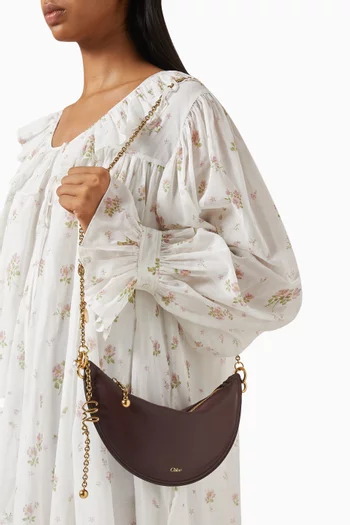 حقيبة ميني بتصميم هلال جلد نابا