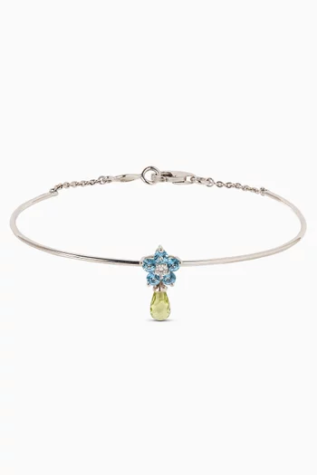 سوار بحلية وردة مرصعة بياقوت أزرق ذهب أبيض عيار 18