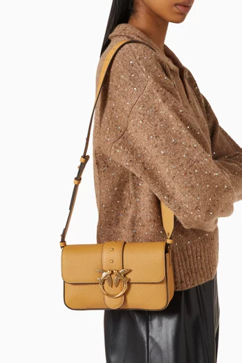 حقيبة كتف لوف وان ميني بتصميم انسيابي جلد