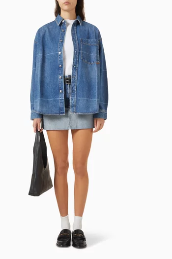 قميص دينم بلون باهت