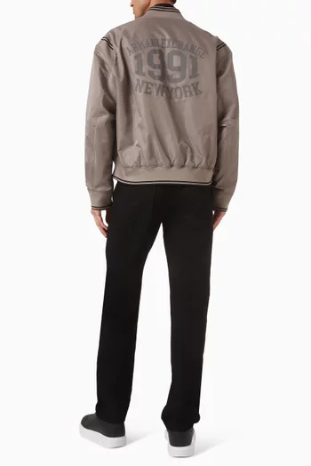 جاكيت بسحّاب وأشرطة بلون مغاير ستان نايلون