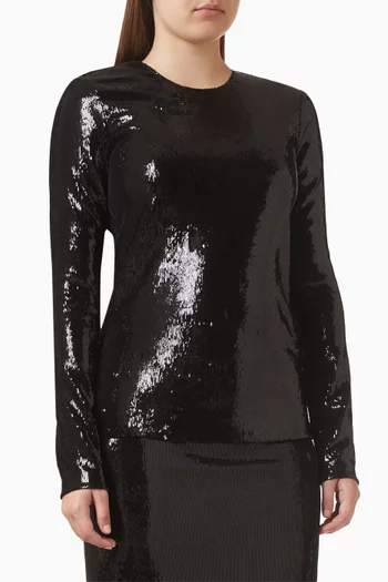 بلوزة مطرزة بالترتر