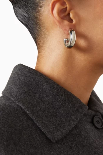 أقراط دائرية نويمي نحاس مطلي بلون فضي