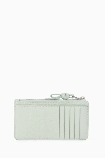 حافظة بطاقات لوب إيست/ويست بسحّاب جلد