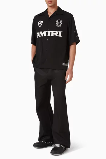 قميص بياقة بطية وطبعة