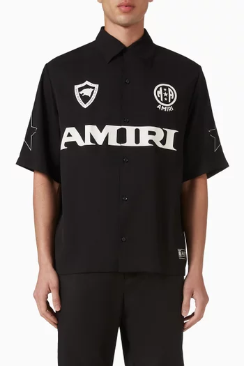 قميص بياقة بطية وطبعة