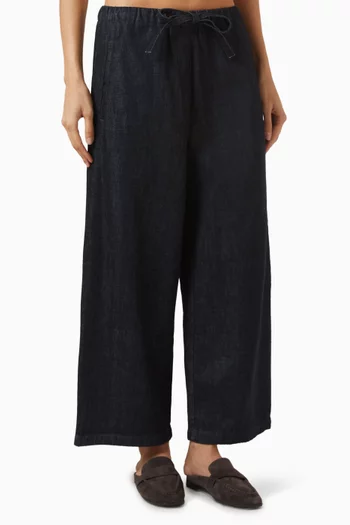 بنطال جينز دينم بقصة ساق واسعة وقصيرة