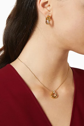 أقراط دائرية مولتن سنو بتصميم ملفوف