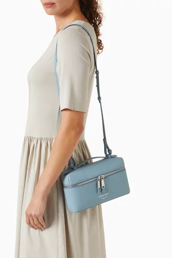 حقيبة مستحضرات تجميل بيد علوية جلد