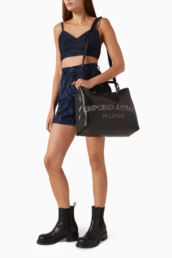 حقيبة يد بشعار الماركة جلد