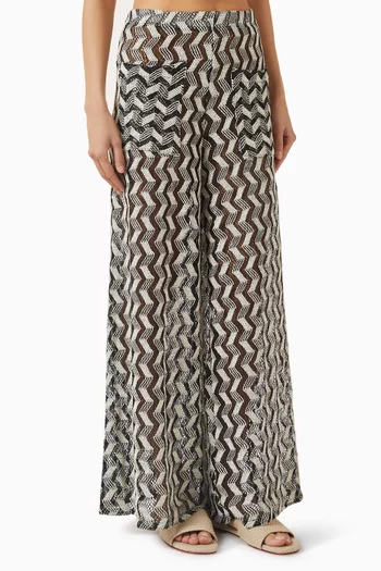 بنطال ييرا واسع الساقين بنقشة خطوط متعرجة