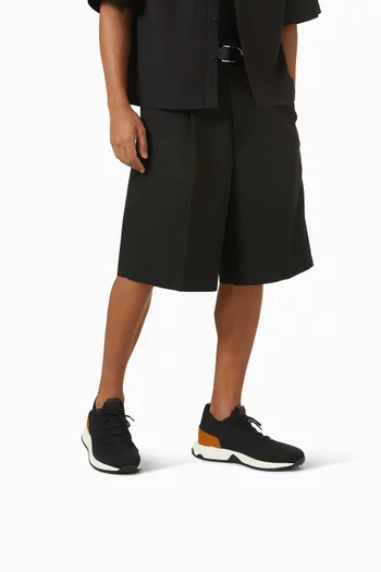 سنيكرز بتصميم جورب قماش معالج وجلد