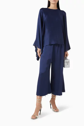 بلوزة بشرّابات مطرزة بلؤلؤ ستان